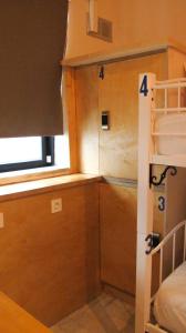 Posteľ alebo postele v izbe v ubytovaní Rhodes Backpackers Boutique Hostel and Apartments