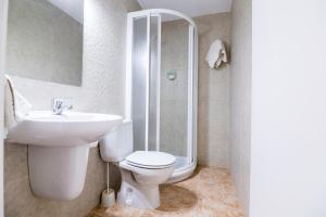 Koupelna v ubytování Hotel Blason Junior