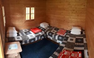 Postel nebo postele na pokoji v ubytování Camping Männisalu