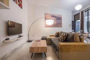 A seating area at Rent&Dream Apartamento Calle Jinetes Malaga