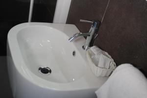 Koupelna v ubytování Hotel Astoria