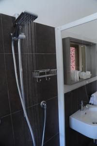 Koupelna v ubytování Hotel Astoria