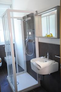 Koupelna v ubytování Hotel Astoria