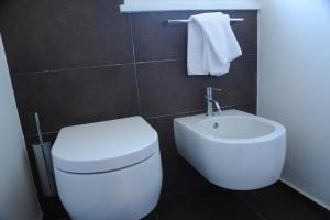 Koupelna v ubytování Hotel Astoria