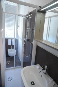 Koupelna v ubytování Hotel Astoria