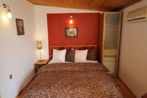 A bed or beds in a room at Ahmet Efendi Evi