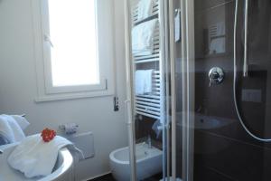 Koupelna v ubytování Hotel Astoria