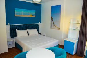 Letto o letti in una camera di Hotel Monaco & Garden