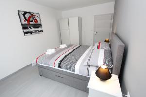 Postel nebo postele na pokoji v ubytování Apartment Karlo 1