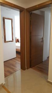 an open door to a room with a bedroom at Villa Srma in Ohrid