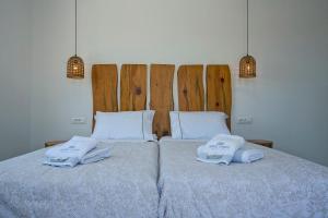 Posteľ alebo postele v izbe v ubytovaní Anna-Maria Mykonos Hotel