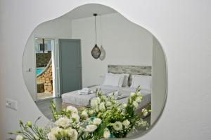 Posteľ alebo postele v izbe v ubytovaní Anna-Maria Mykonos Hotel