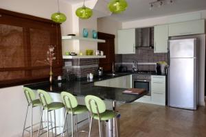 Kuchyň nebo kuchyňský kout v ubytování Truffle Residences Apartments