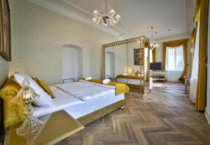 Voodi või voodid majutusasutuse Art Hotel Kaštieľ toas