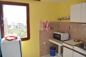 Kuchyň nebo kuchyňský kout v ubytování Orebic Garden House