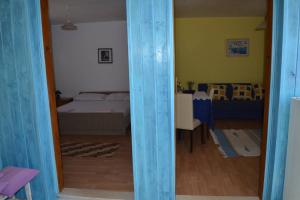 Postel nebo postele na pokoji v ubytování Orebic Garden House