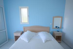 Posteľ alebo postele v izbe v ubytovaní Dimitra Apartment Hotel