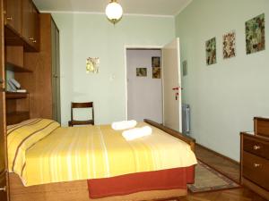 Ένα ή περισσότερα κρεβάτια σε δωμάτιο στο Rooms Carpe Diem