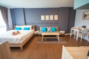 Postel nebo postele na pokoji v ubytování Baan Imm Aim Huahin by Alice + 25 fotografií