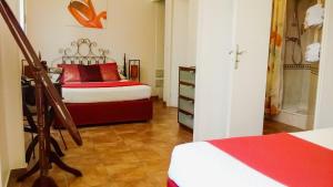 Postel nebo postele na pokoji v ubytování Le Panoramic Boutique Hôtel