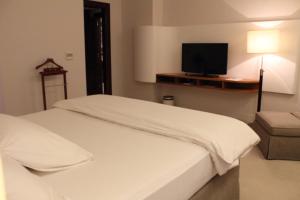 Кровать или кровати в номере K108 Hotel Doha