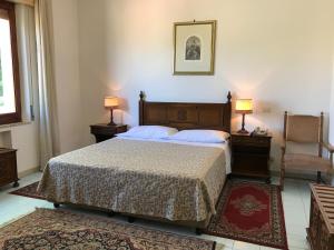 Postel nebo postele na pokoji v ubytování Hotel Mediterranée