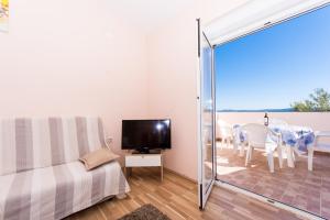 TV/Unterhaltungsangebot in der Unterkunft Apartman Anamarija