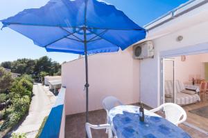 Ein Balkon oder eine Terrasse in der Unterkunft Apartman Anamarija