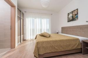 Postel nebo postele na pokoji v ubytování VILE DALMACIJA 365 Sukošan, Zadar county