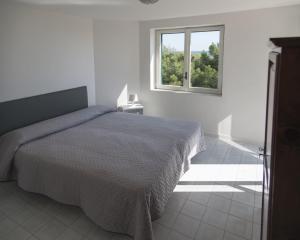 Afbeelding uit fotogalerij van Homeholiday Giulivo in Baia Domizia