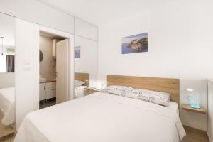 Ένα ή περισσότερα κρεβάτια σε δωμάτιο στο ABC apartments