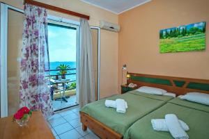 Voodi või voodid majutusasutuse Costa Hotel toas