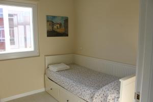 A bed or beds in a room at Disfruta León a pie