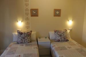 A bed or beds in a room at Disfruta León a pie