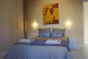 A bed or beds in a room at Disfruta León a pie