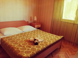 Posteľ alebo postele v izbe v ubytovaní apartman Kate