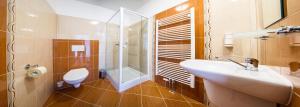 Koupelna v ubytování Hotel Na Farmě Choťovice