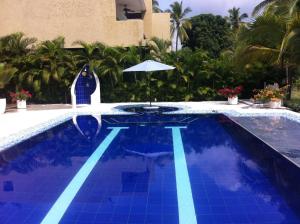 Bazén v ubytování HERMOSA CASAQUINTA FAMILIAR CONDOMINIO CAMPESTRE EL PEÑON Piscina Privada Campo de Golf nebo v jeho okolí