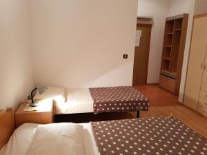 Postel nebo postele na pokoji v ubytování Guesthouse Palombaro