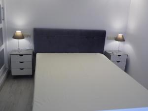 Posteľ alebo postele v izbe v ubytovaní Apartments Easy La Nogalera