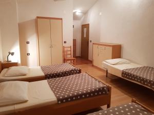 Postel nebo postele na pokoji v ubytování Guesthouse Palombaro