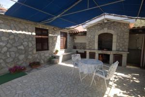 Patio nebo venkovní prostory v ubytování Apartments Cvelic Milovcic