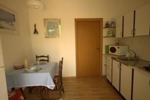 Kuchyň nebo kuchyňský kout v ubytování Apartments Cvelic Milovcic