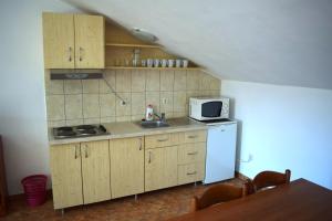 Kuchyň nebo kuchyňský kout v ubytování Apartments Matulic