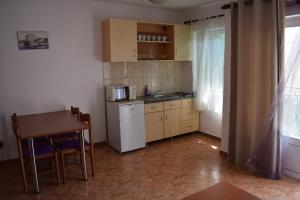 Kuchyň nebo kuchyňský kout v ubytování Apartments Matulic