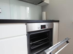 A cozinha ou kitchenette de Grand Tourist Simple Rest Apartments