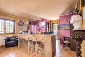 a kitchen with a counter top and a sink at Villa Gengi in Ardea