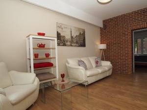 Uma área de estar em Grand Tourist Simple Rest Apartments