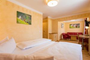 Postel nebo postele na pokoji v ubytování Hotel Freiensteinerhof Superior + 37 fotografií