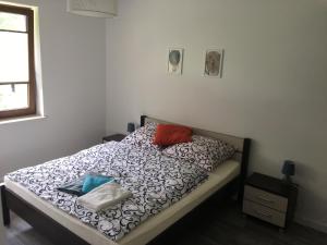 Posteľ alebo postele v izbe v ubytovaní Apartament Danusia